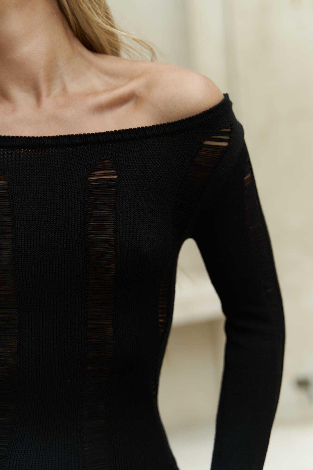 Close-up of lace-texture knit and elegant fit on Selene dress