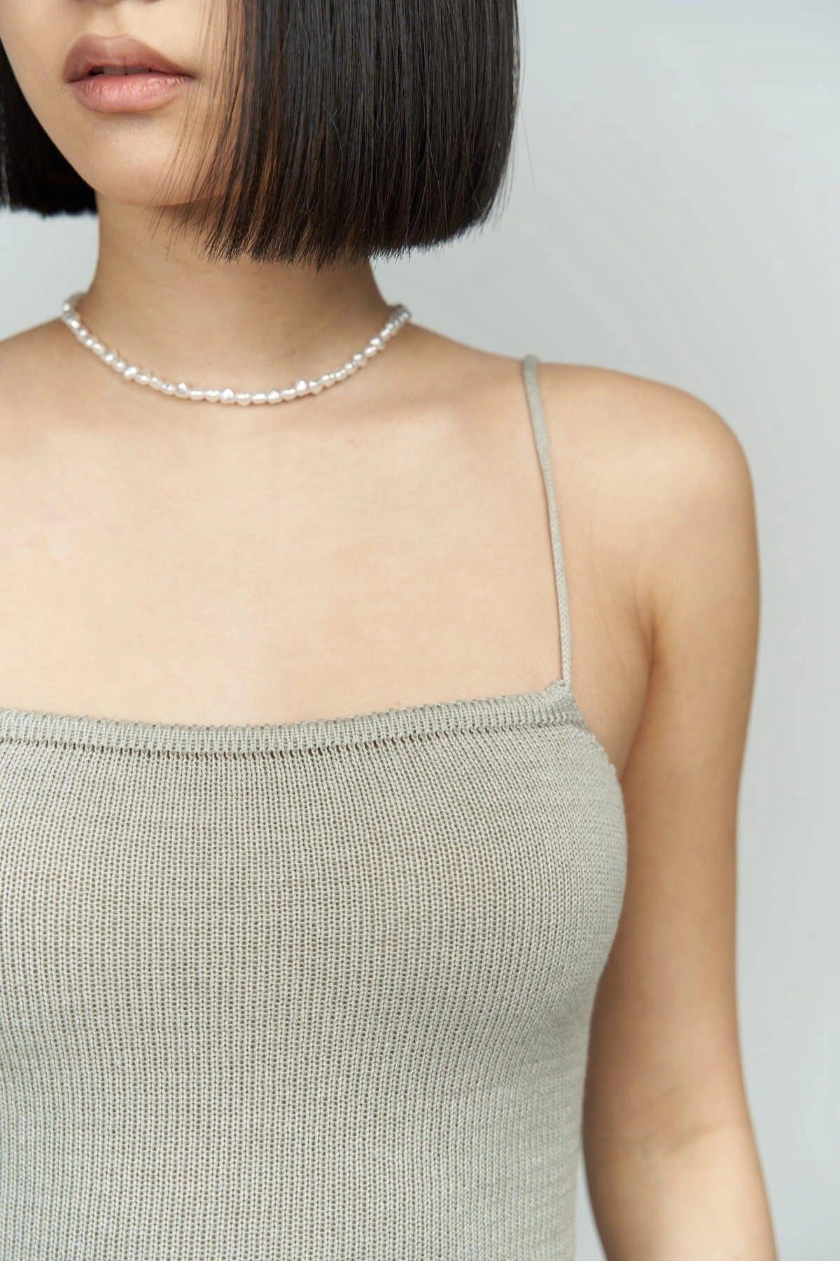 Close-up photo from ribbed knit dress details, focusing on color with bohemian style summer wear.