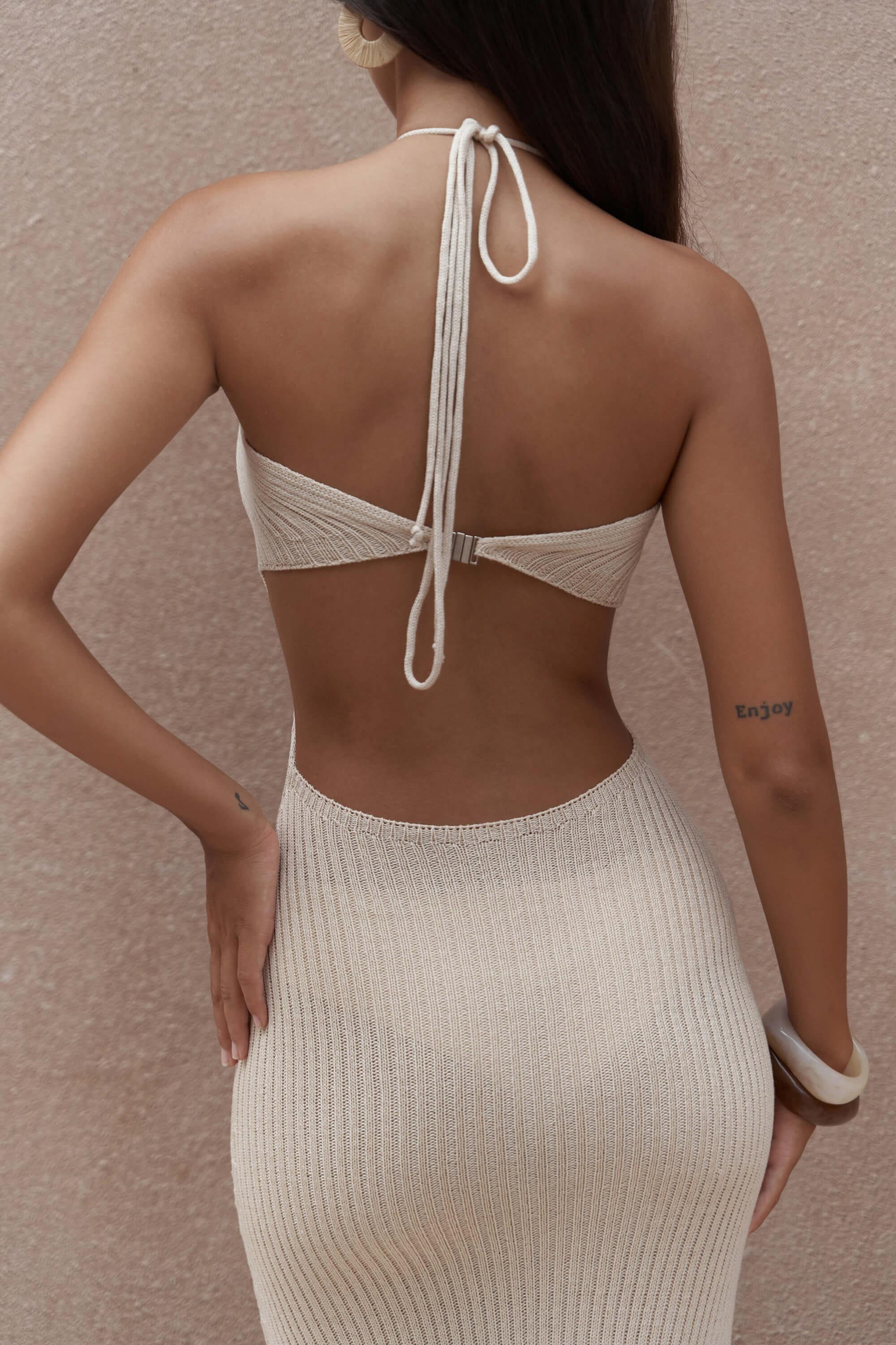 Cut-out knit dress styled with open back and keyhole front