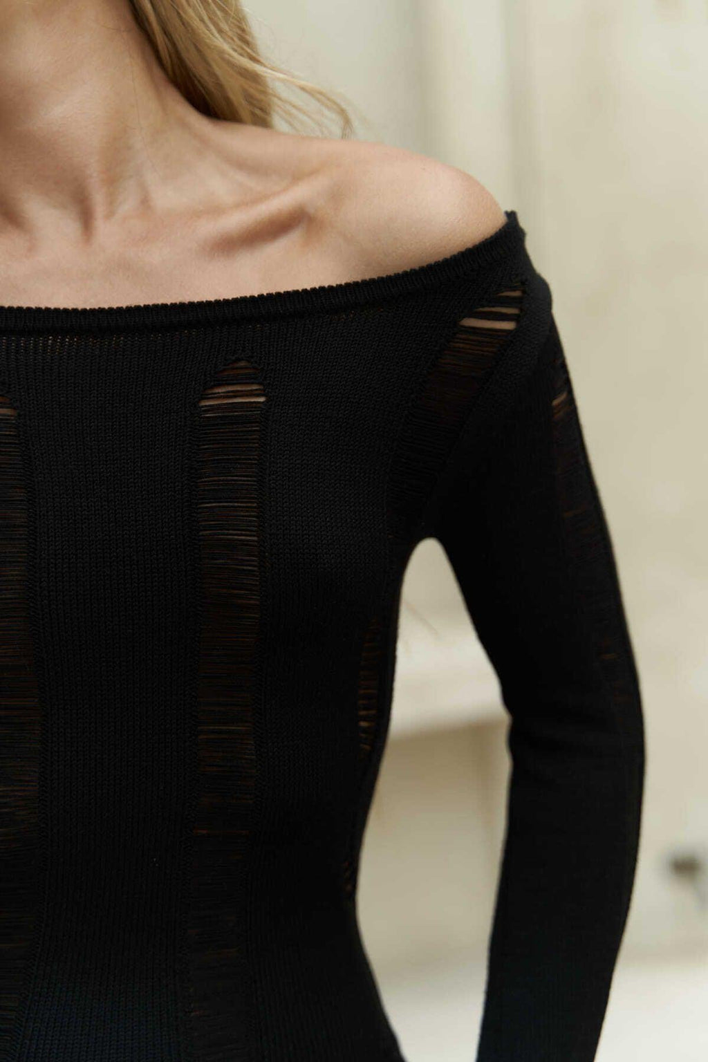 Close-up of lace-texture knit and elegant fit on Selene dress
