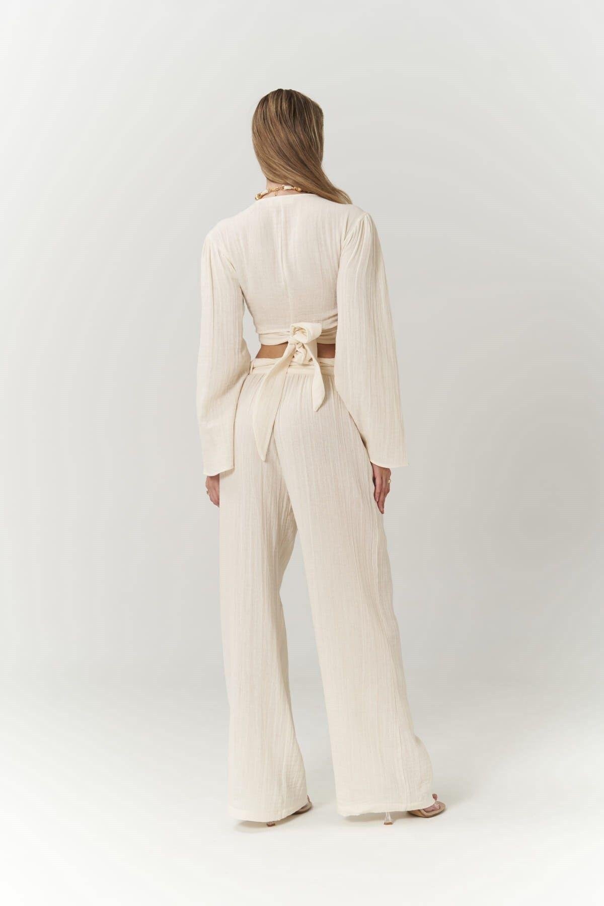 Long sleeve wrap crop top and wide-leg muslin pants