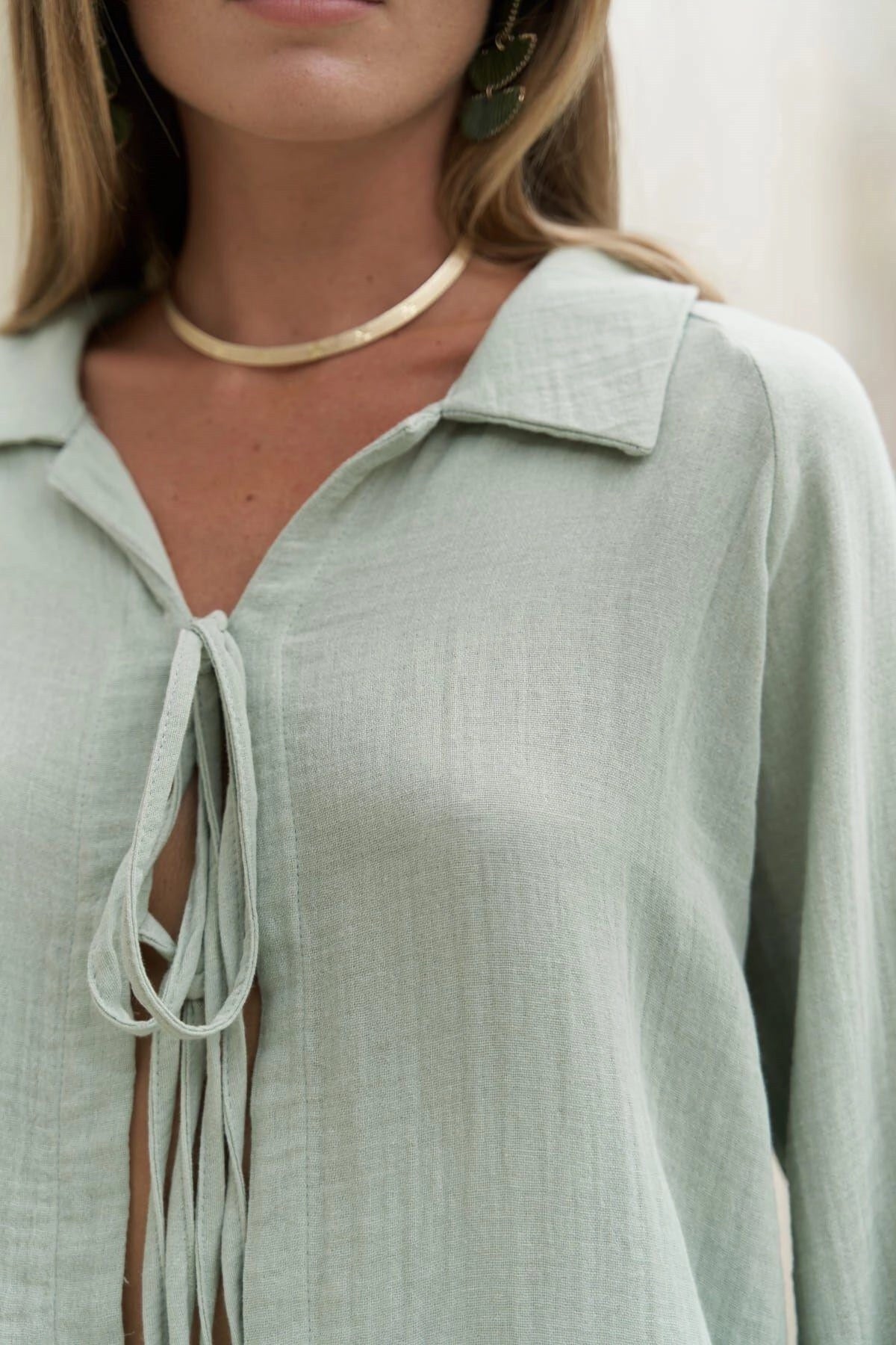 Detail of lightweight muslin fabric on relaxed resortwear set