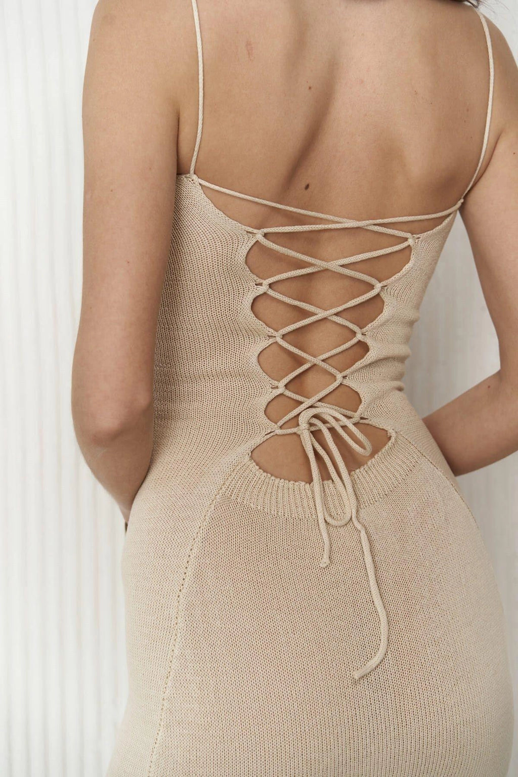 Backline details close-up photo for dress details, it shows how the dress can be tied up from back.