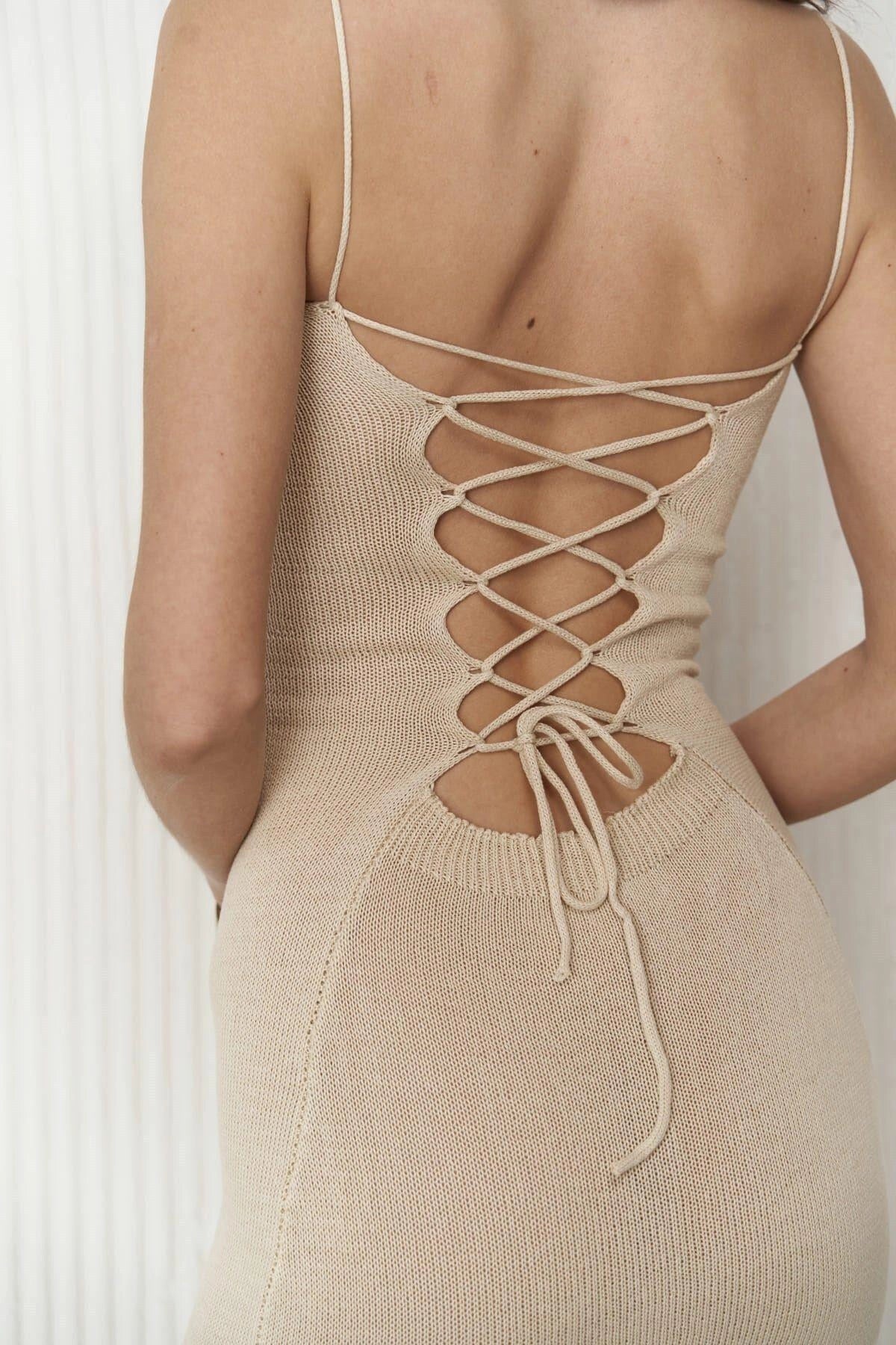 Backline details close-up photo for dress details, it shows how the dress can be tied up from back.