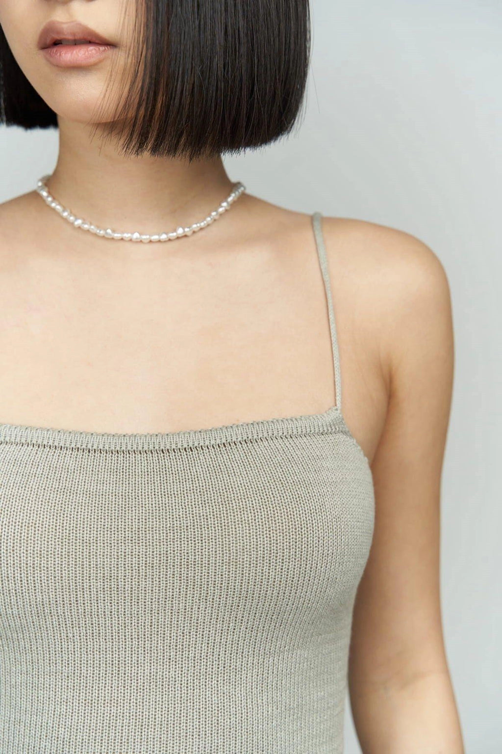 Close-up photo from ribbed knit dress details, focusing on color with bohemian style summer wear.