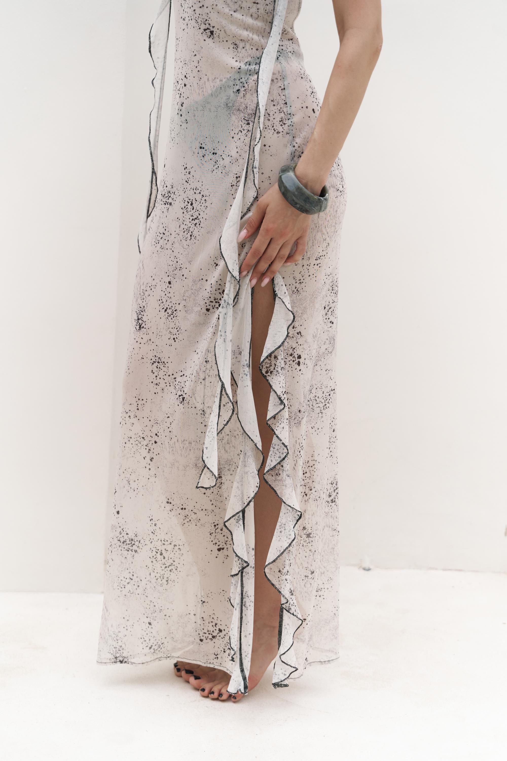 A close-up of the ruffle detail on the maxi dress