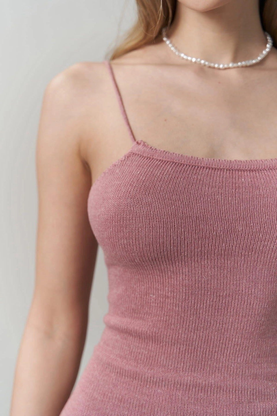 Close-up of ribbed knit texture on Luna mini dress with thin straps