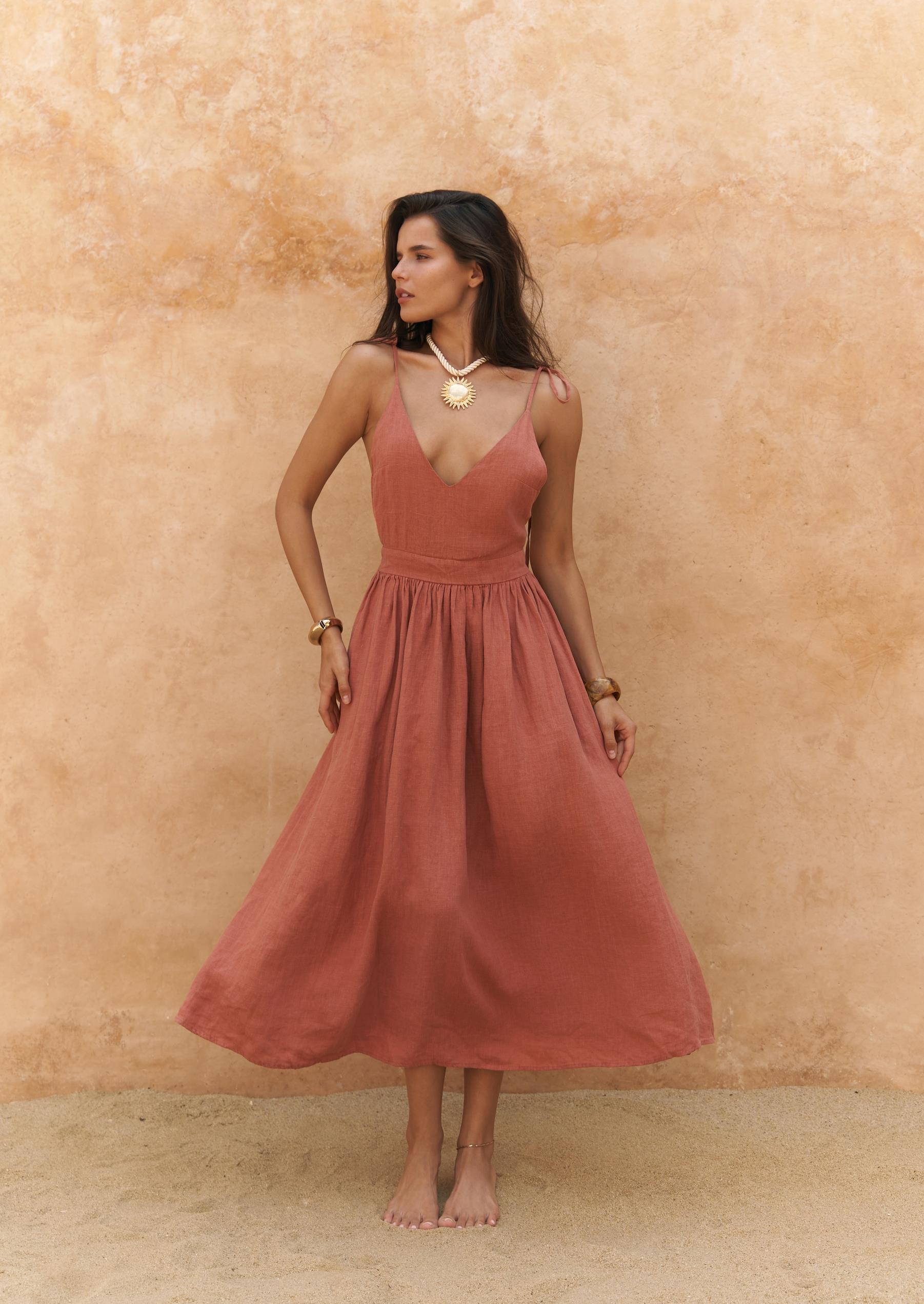 Model wearing SHAÉN’s cinnamon linen midi dress