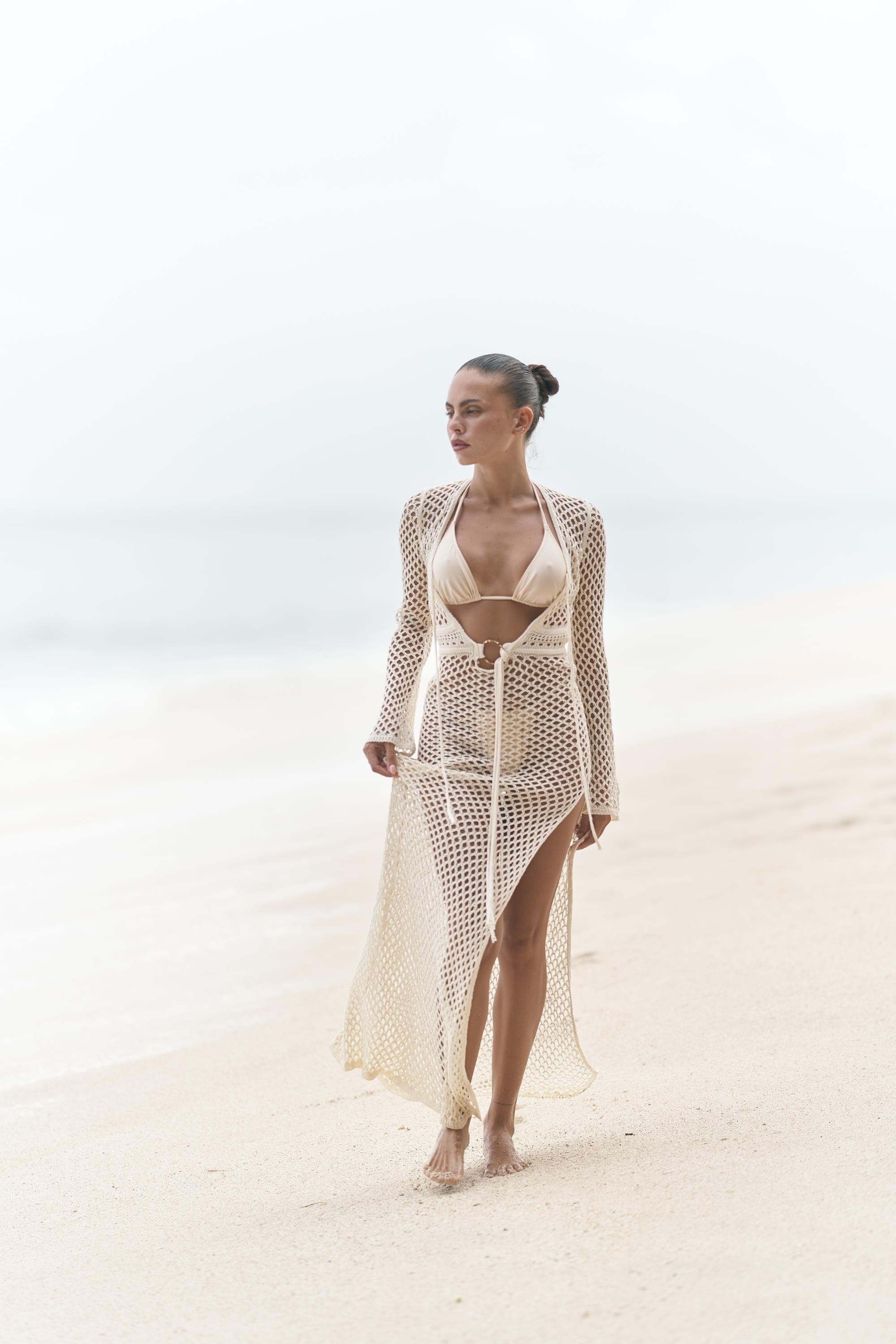 Beachwear look featuring open-knit tie cardigan in sand with ring waist detail.