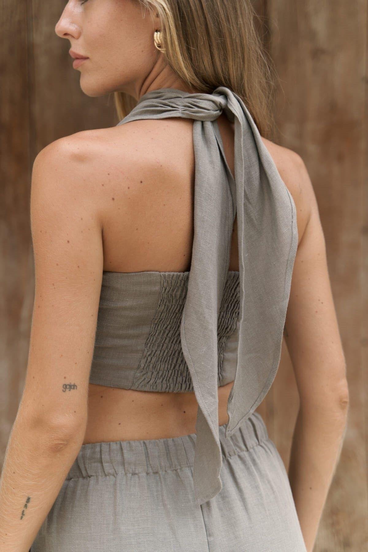 Halter neck crop top and drawstring linen trousers