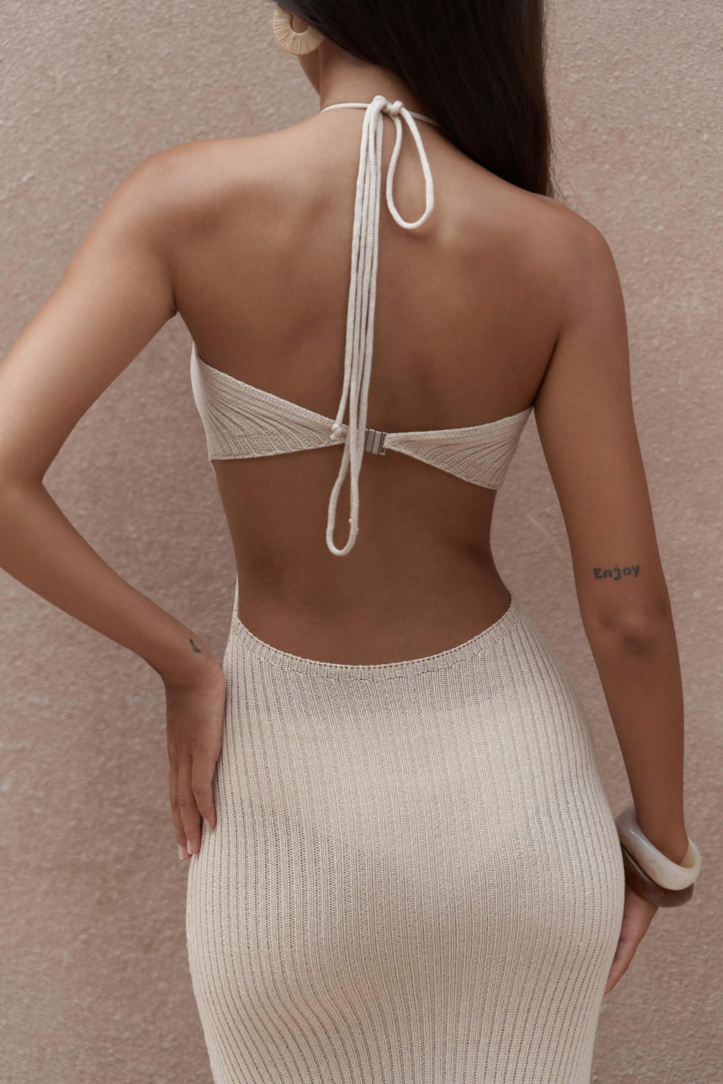 Cut-out knit dress styled with open back and keyhole front